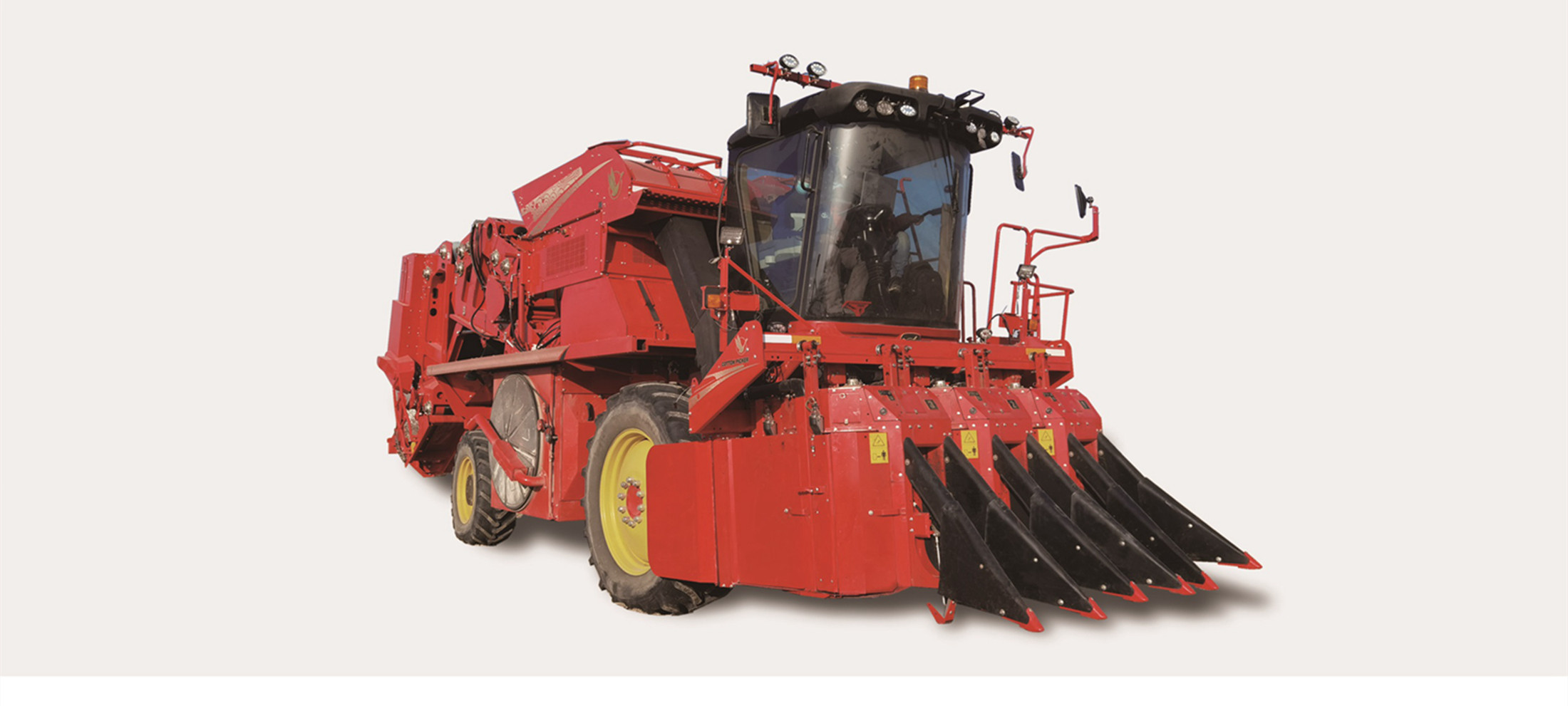 Three-row cotton harvester